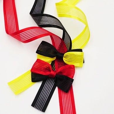 Набір тканинних стрічок червоного, чорного та жовтого кольору