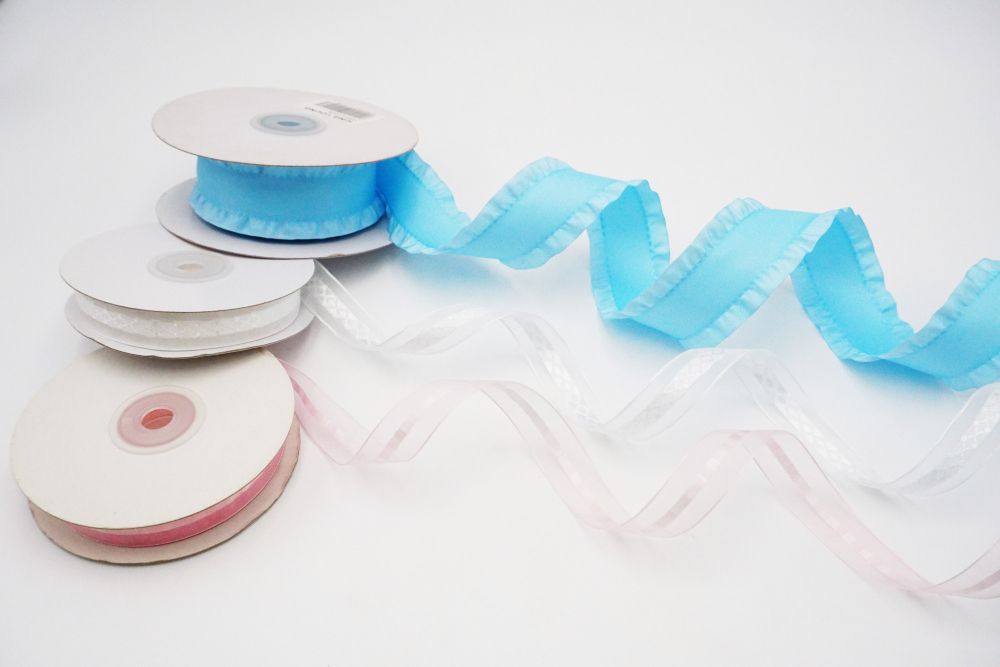 Conjunto de cintas de organza transparente en tono azul/rosa suave