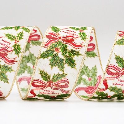 Wstążka z napisami świątecznymi i ostrokrzewem
